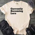 Currently Becoming Lore T-Shirt