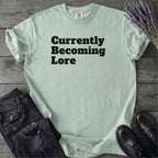 Currently Becoming Lore T-Shirt