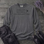 Currently Becoming A Cautionary Tale Long Sleeve T-Shirt