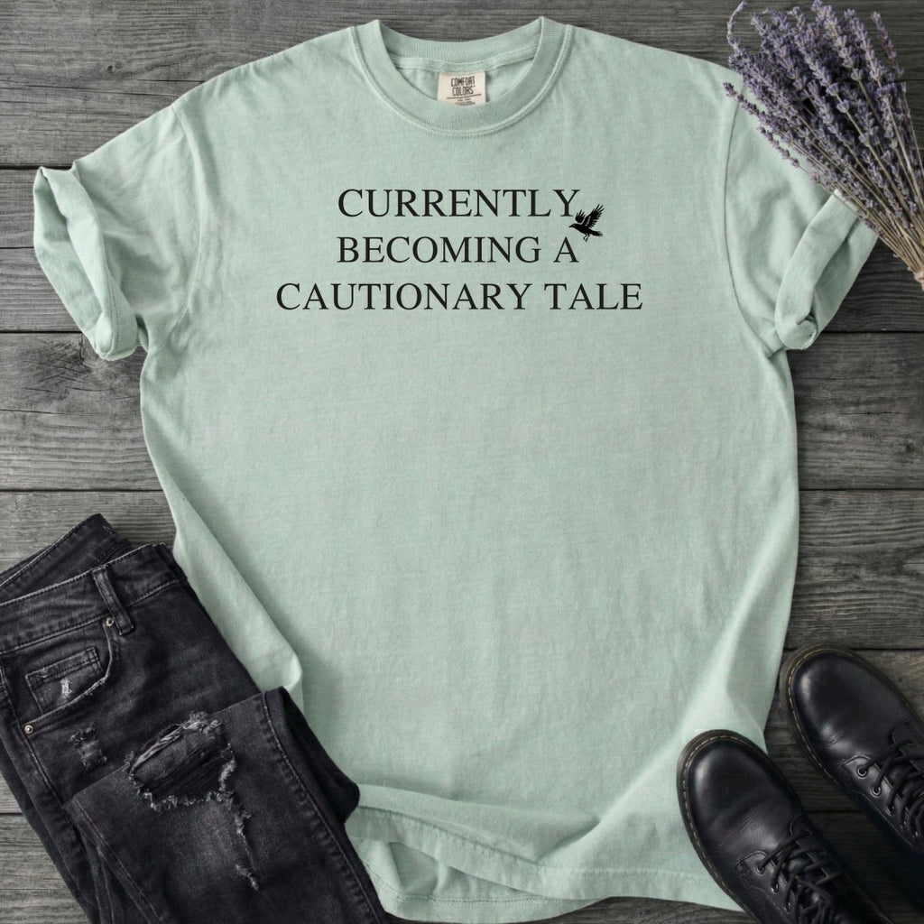 Currently Becoming A Cautionary Tale T-Shirt
