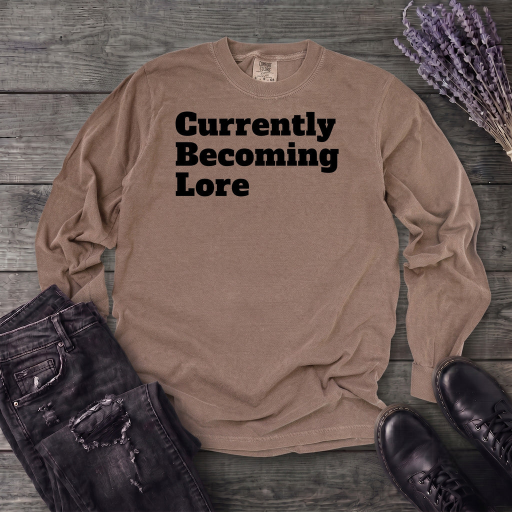 Currently Becoming Lore Long Sleeve T-Shirt