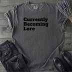 Currently Becoming Lore T-Shirt